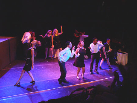 The ensemble dances "The Frug".