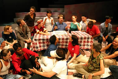 Rob McQuay as Jesus and the ensemble at the last supper